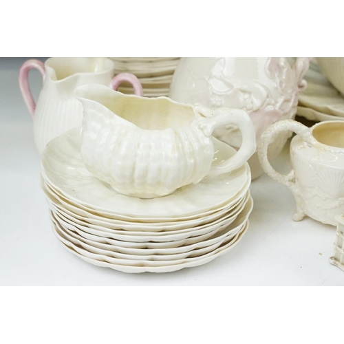 65 - Collection of Belleek moulded cream ceramics, 1st & 2nd period, to include a reticulated basket, 31 ... 