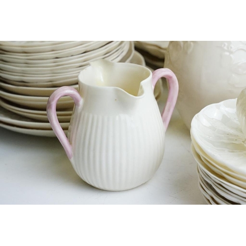 65 - Collection of Belleek moulded cream ceramics, 1st & 2nd period, to include a reticulated basket, 31 ... 