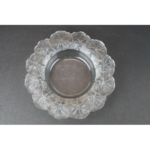 74 - Lalique 'Honfleur' pattern moulded glass circular dish, the border moulded with frosted leaves, sign... 