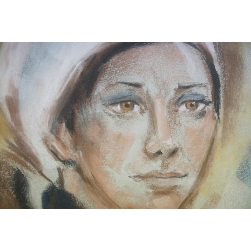 522 - 20th century Signed Pastel and Chalk Portrait of a Young Woman in outdoor attire, 47.5cm x 31cm