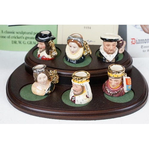 97 - Set of Six Royal Doulton 'Kings & Queens of the Realm' tiny character jugs on wooden display stand (... 