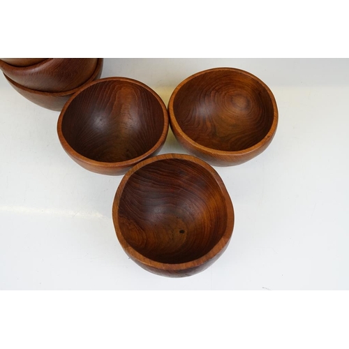 176 - Set of six mid 20th C carved teak bowls by Peter John, stamped to bases, approx 15cm diameter