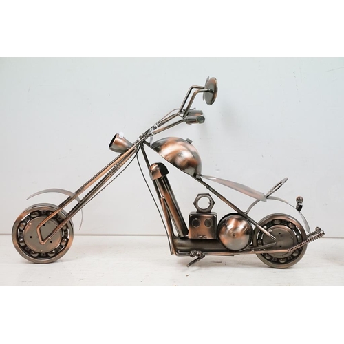 445 - Two Steam Punk type motorcycle models with copper finish. Each approx 82cm long