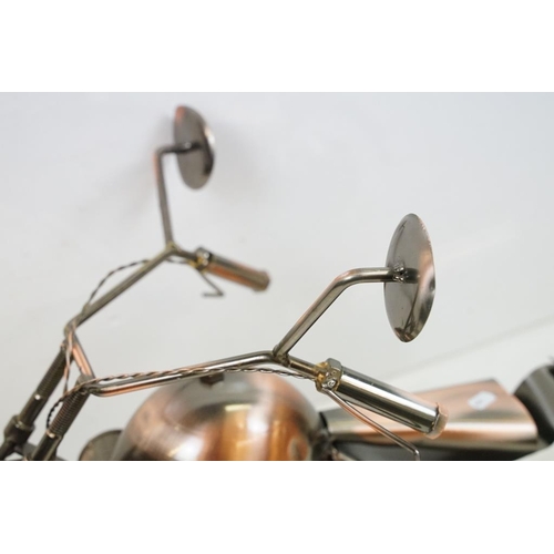 445 - Two Steam Punk type motorcycle models with copper finish. Each approx 82cm long