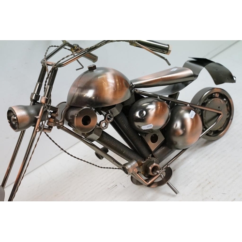 445 - Two Steam Punk type motorcycle models with copper finish. Each approx 82cm long