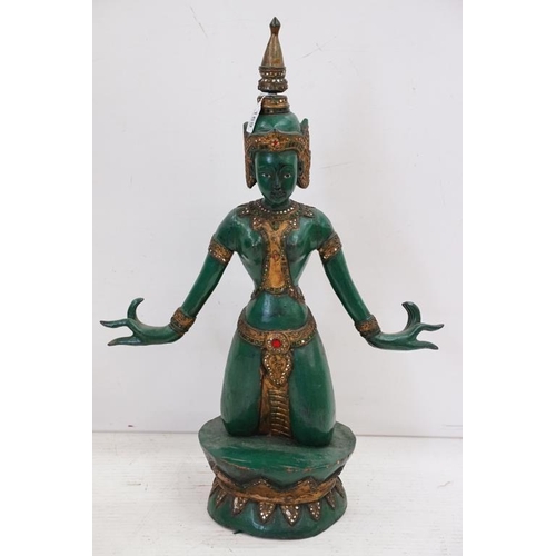 169 - Green lacquered & gilt wooden sculpture of a kneeling Thai Buddhai, with jewel effect decoration, ra... 