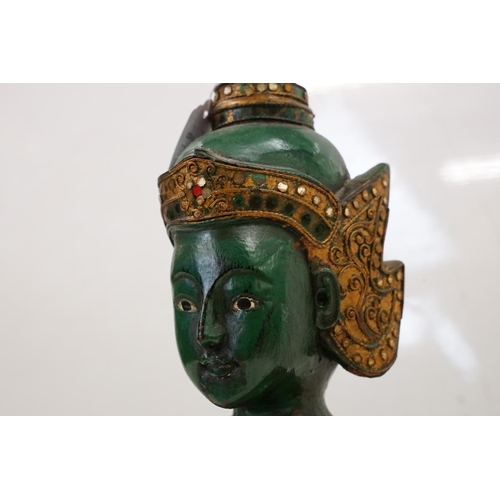 169 - Green lacquered & gilt wooden sculpture of a kneeling Thai Buddhai, with jewel effect decoration, ra... 