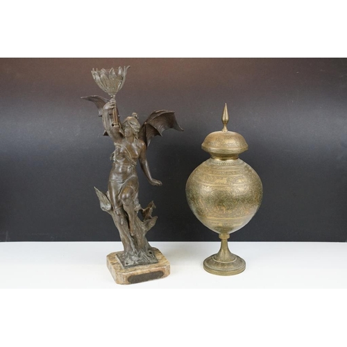 171 - Bronze lamp base in the form of a lady with batwings holding a torch aloft, raised on a marble base ... 