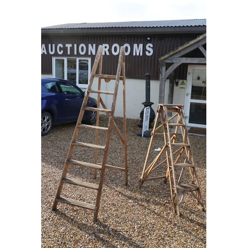 537 - Two vintage wooden folding decorators step ladders, the largest approx 200cm high, the other with me... 