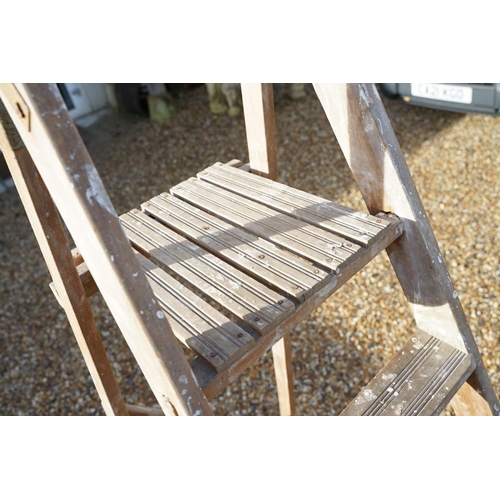 537 - Two vintage wooden folding decorators step ladders, the largest approx 200cm high, the other with me... 