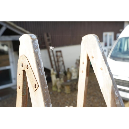 537 - Two vintage wooden folding decorators step ladders, the largest approx 200cm high, the other with me... 