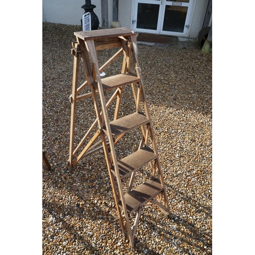 537 - Two vintage wooden folding decorators step ladders, the largest approx 200cm high, the other with me... 