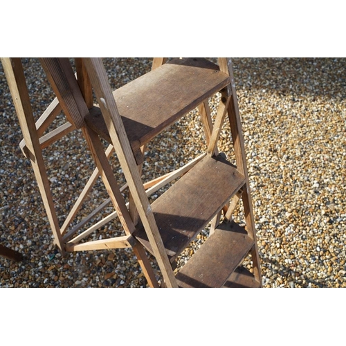 537 - Two vintage wooden folding decorators step ladders, the largest approx 200cm high, the other with me... 