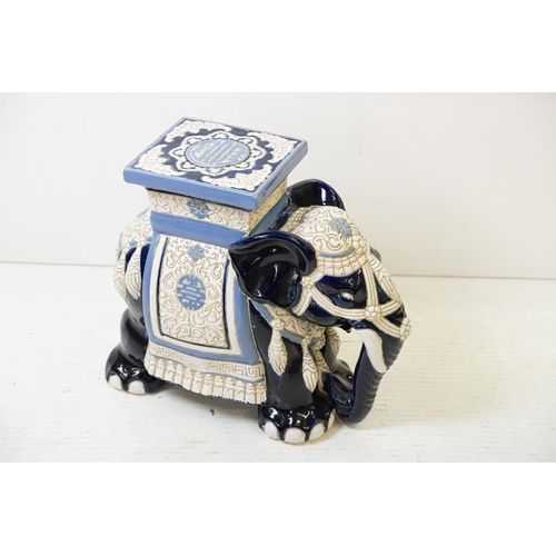 55 - 20th Century Chinese blue ground garden seat modelled as an elephant, approx 42cm high