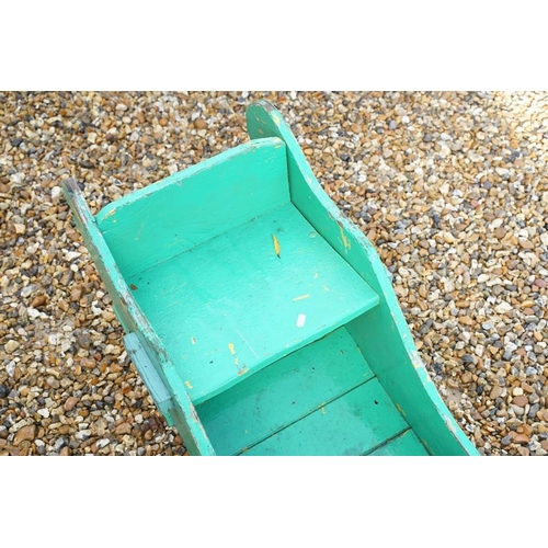 539 - Painted wooden fairground swing boat, with seat at either end, approx 144cm long