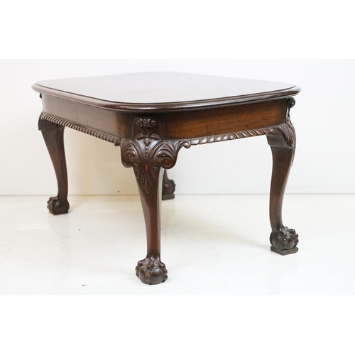 553 - Early 20th century Mahogany Low Table with curved ends, raised on carved cabriole legs with ball and... 