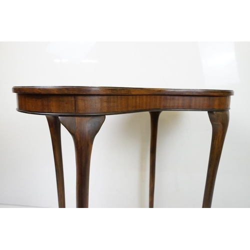 555 - Early 20th century Mahogany Side Table of kidney form, raised on slender carbiole legs, 77cm long x ... 