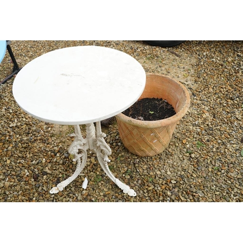 541 - Cast metal painted patio table (approx 70cm high), together with a terracotta plant pot with lattice... 