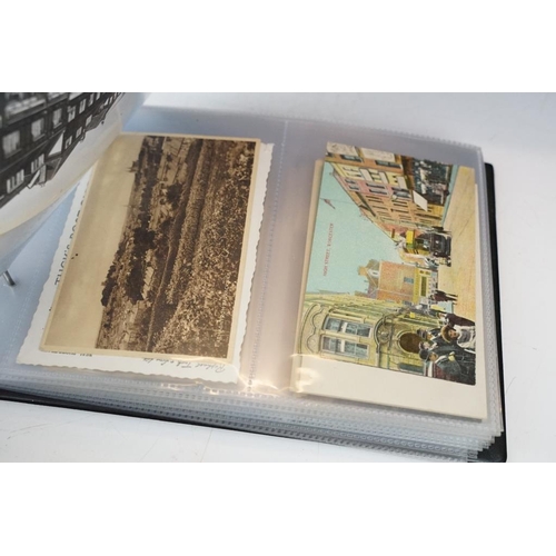 390 - Album of early-to-mid 20th century postcards to include black & white and colour examples, featuring... 