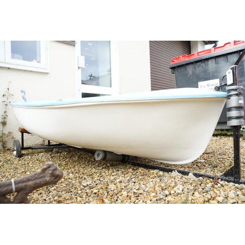 542A - Fibreglass rowing boat in pale blue, with white hull, two sets of oars, three life jackets and road ... 