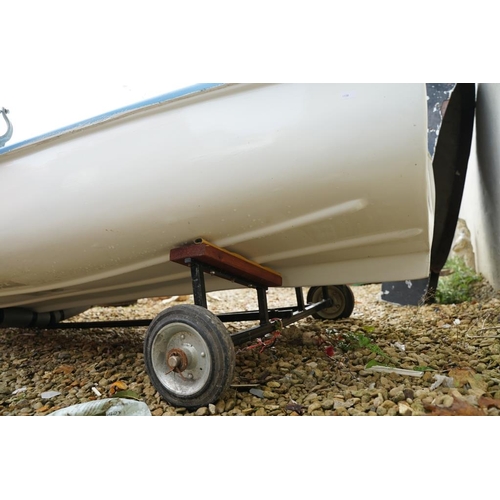 542A - Fibreglass rowing boat in pale blue, with white hull, two sets of oars, three life jackets and road ... 