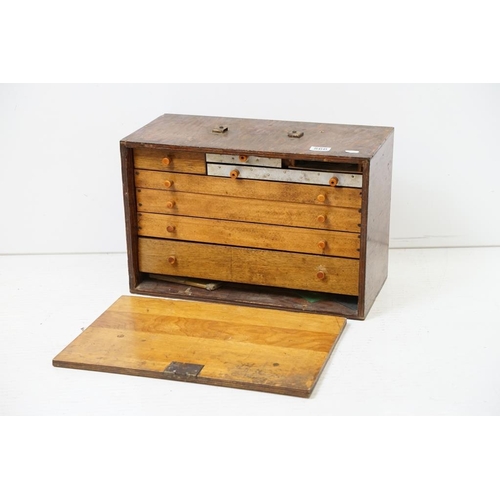 566 - Early 20th century Wooden Engineer's Cabinet, the front cover lifting off to an arrangement of seven... 