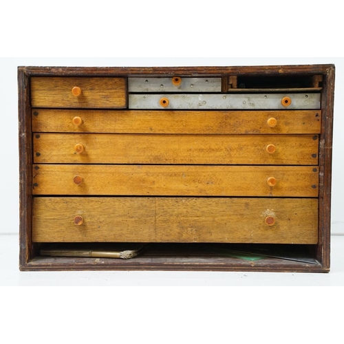 566 - Early 20th century Wooden Engineer's Cabinet, the front cover lifting off to an arrangement of seven... 