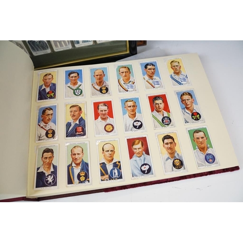 392 - Collection of cigarette cards, to include two albums, framed & loose examples, featuring Players Cri... 