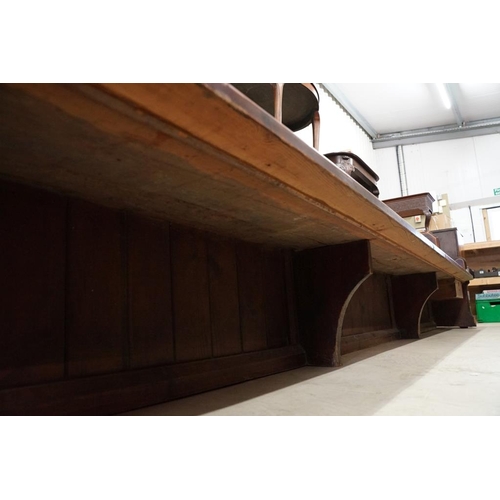 581 - Late 19th / Early 20th century Long Pine Church or Chapel Pew, housing a lockable box under seat, wi... 