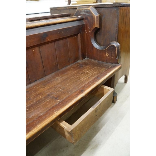 581 - Late 19th / Early 20th century Long Pine Church or Chapel Pew, housing a lockable box under seat, wi... 