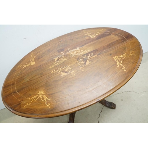 584 - Victorian Walnut and Marquetry Inlaid Oval Tilt Top Loo Table, raised on five turned column supports... 