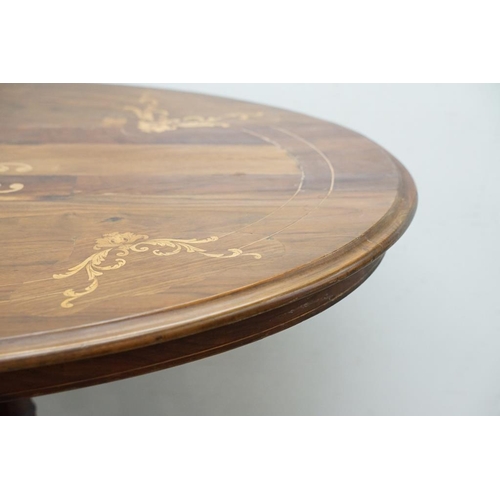 584 - Victorian Walnut and Marquetry Inlaid Oval Tilt Top Loo Table, raised on five turned column supports... 