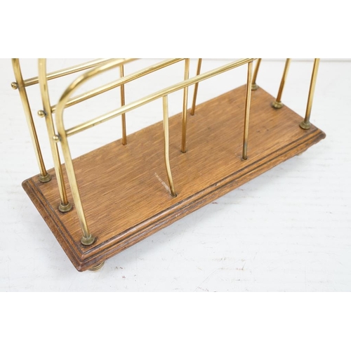 586 - Edwardian Brass and Oak Magazine Rack, 37cm high