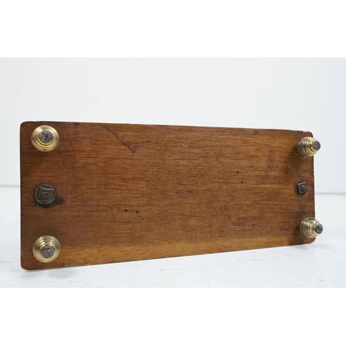 586 - Edwardian Brass and Oak Magazine Rack, 37cm high