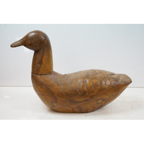 401 - Four carved wooden animals to include a large duck (approx 40cm high), folk art horse, seated pig an... 