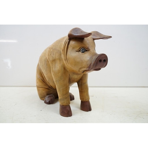 401 - Four carved wooden animals to include a large duck (approx 40cm high), folk art horse, seated pig an... 