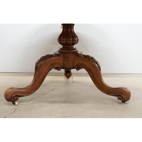 592 - Victorian Flamed Mahogany Circular Tilt Top Breakfast Table raised on a bulbous reeded support and t... 