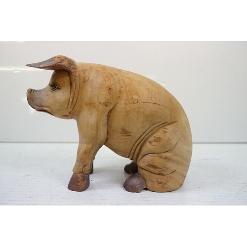 401 - Four carved wooden animals to include a large duck (approx 40cm high), folk art horse, seated pig an... 