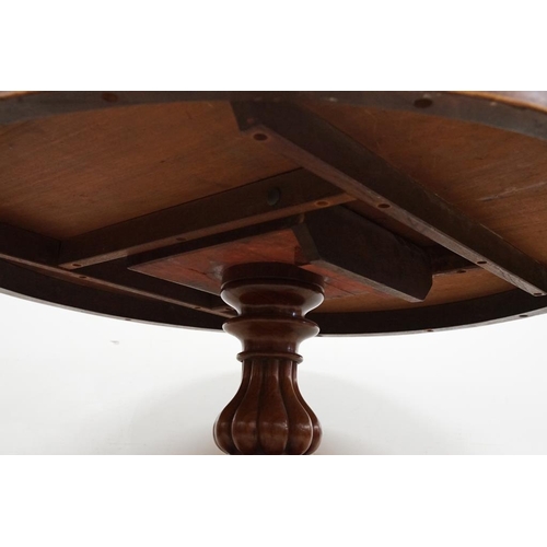 592 - Victorian Flamed Mahogany Circular Tilt Top Breakfast Table raised on a bulbous reeded support and t... 