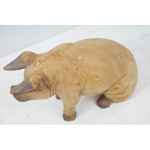 401 - Four carved wooden animals to include a large duck (approx 40cm high), folk art horse, seated pig an... 