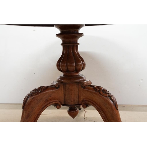 592 - Victorian Flamed Mahogany Circular Tilt Top Breakfast Table raised on a bulbous reeded support and t... 