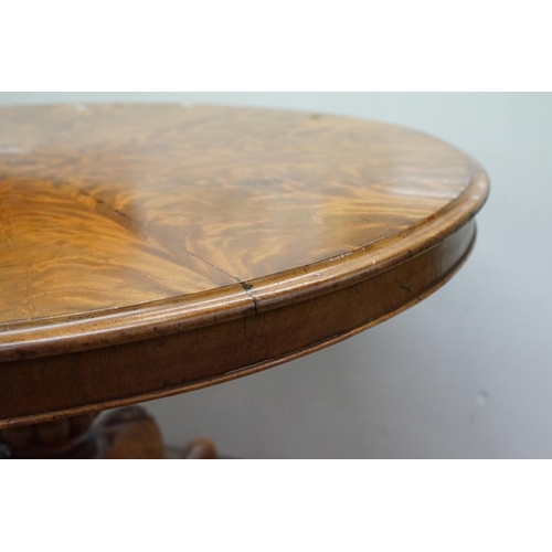 592 - Victorian Flamed Mahogany Circular Tilt Top Breakfast Table raised on a bulbous reeded support and t... 