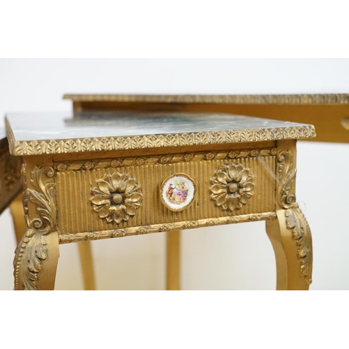 600 - Nest of Three French style Tables with faux marble tops of serpentine form and gilt coloured legs, s... 