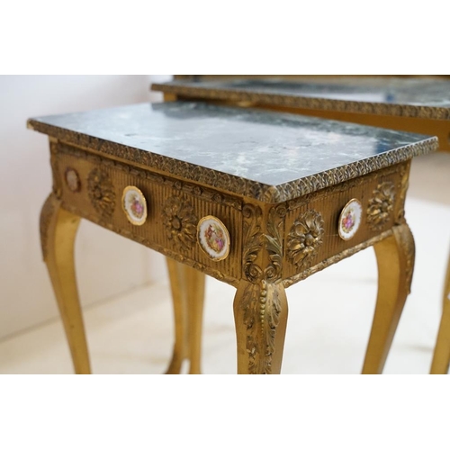 600 - Nest of Three French style Tables with faux marble tops of serpentine form and gilt coloured legs, s... 