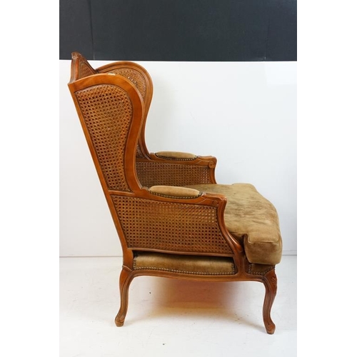 612 - French style Wing Back Bergere Armchair with upholstered cushion seat, raised on short cabriole legs... 