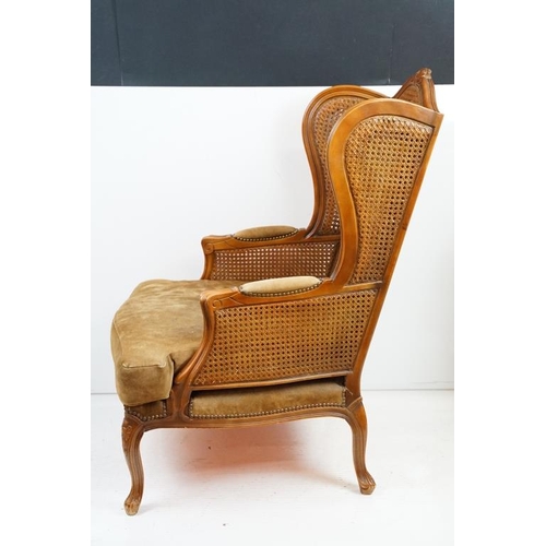 612 - French style Wing Back Bergere Armchair with upholstered cushion seat, raised on short cabriole legs... 