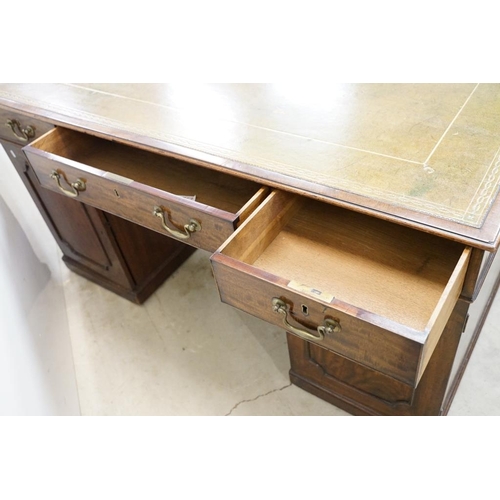 616 - 19th century Mahogany Partner's Desk with green leather inset top, with an arrangement of nine drawe... 