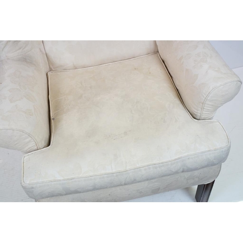 623 - Georgian style Wing Back Armchair with cream upholstery and H-stretcher, 84cm wide x 88cm deep x 106... 