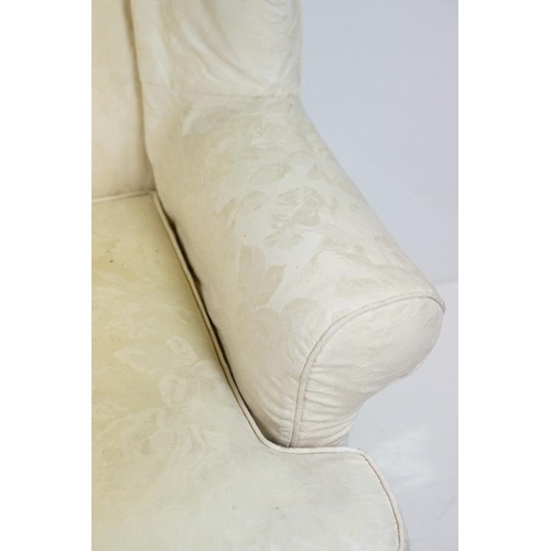 623 - Georgian style Wing Back Armchair with cream upholstery and H-stretcher, 84cm wide x 88cm deep x 106... 