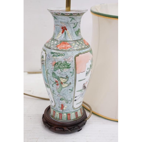 420 - Chinese Famille Verte converted vase lamp base with panels depicting warriors and a horse, raised on... 